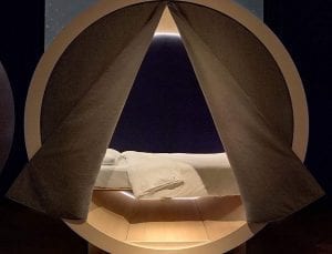 tent opening up to a bed